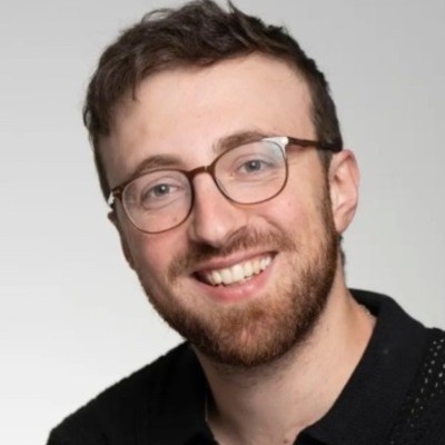 Close portrait, smiling.